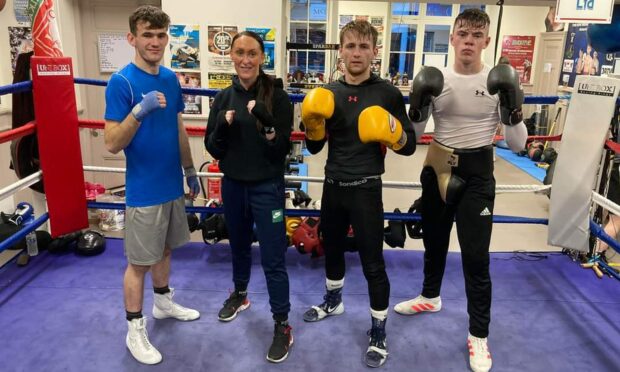 From left: Calum Turnbull, coach Lorna Redfern, George Stewart and coach Alistair Last in the gym this week.
Image: Laurie Redfern