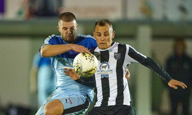 Fraserburgh's Greg Buchan, right, was on the losing side in last season's Aberdeenshire Shield final against Banks o' Dee.