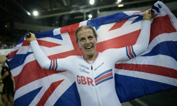 Britain's Neah Evans celebrates after winning the Women's Points race final at the Track Cycling World Championship in  Saint-Quentin-en-Yvelines, west of Paris, France.