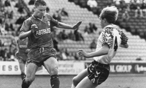 Andy Gibson in action for Aberdeen in a match against Falkirk in 1992.  Image: DC Thomson.