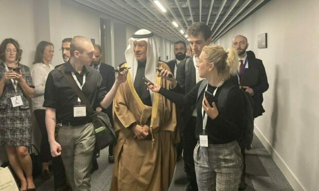 Prince Abdulaziz bin Salman and Energy Voice reporter Ryan Duff on the left. Supplied by World Energy Council