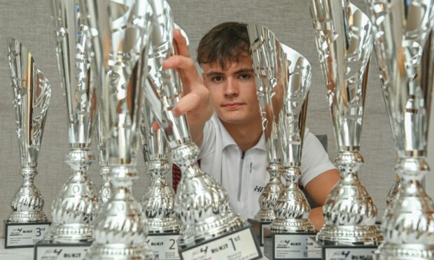 Oliver Stewart with his trophy haul from the 2022 F4 British Championship season.