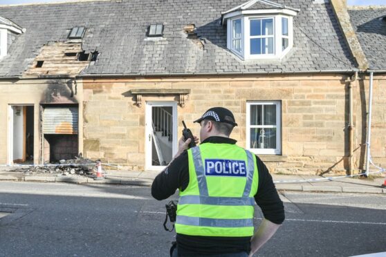 The property was cordoned off, including the pavement outside. Image: Jason Hedges/DC Thomson.