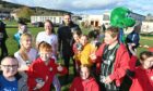 MSP Maree Todd, "Lionel Nessie" and local footballers were just a few of the celebrities out at Dalneigh Primary School on Friday. Image: Jason Hedges / DC Thomson