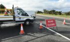 The A96 road at Drumine near Inverness Airport was closed for about four hours on Tuesday. Image: Jason Hedges / DC Thomson.