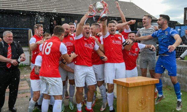 Culter celebrating winning the Grill League Cup final. Picture by Kenny Elrick