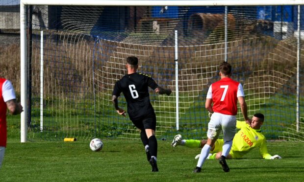 Ross Clark, right, netted four. Image: Kenny Elrick