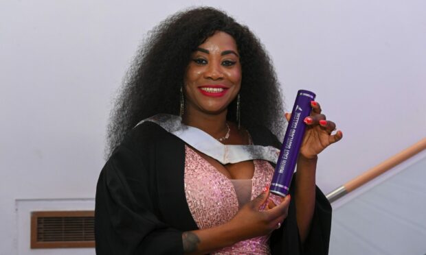Mercy Brown with her scroll on Wednesday. Image: Kenny Elrick.