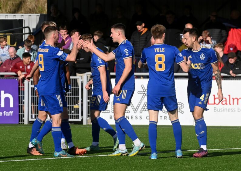 Connor Scully is congratulated after opening the scoring. Image: Kenny Elrick/DC Thomson