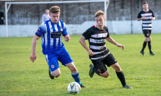 Newmachar's Josh Reynolds and Sunnybank's Robbie Campbell. Image: Kath Flannery/ DC Thomson