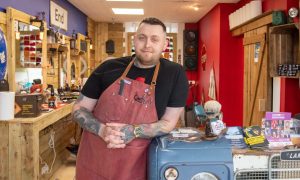 Marcin Masny is the owner of Cushty Cuts in Inverurie. Image:  Kami Thomson/DC Thomson