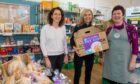 Rural Affairs Secretary Mairi Gougeon, Scottish SPCA chief executive Kirsteen Campbell and Julie Ann Gray, manager at The Haven, discussed the Pet Aid initiative in Stonehaven on Friday. Image: Kami Thomson/DC Thomson.