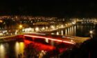 Ness Bridge lit up red for Poppyscotland. Image: Poppyscotland.