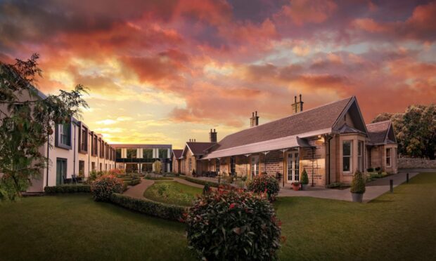Ness Walk hotel in a sunset picture. The picture shows the Torrish restaurant . Image: Ness Walk.