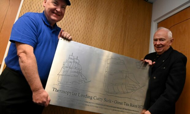Stanley Bruce and Captain Peter King with the commemorative plaque. Picture by Paul Glendell.