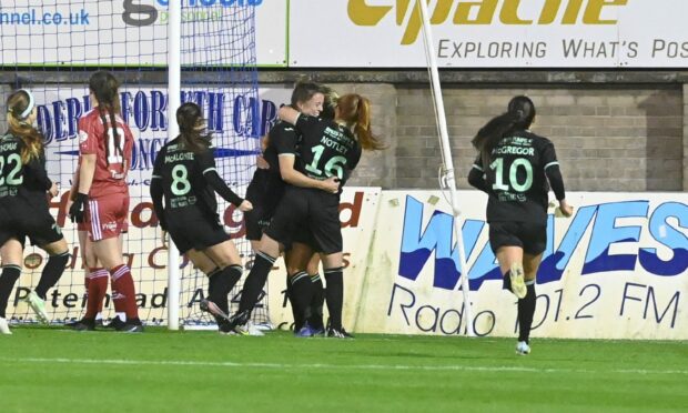 Aberdeen Women were defeated 3-1 by Hibs, pictured celebrating, in SWPL 1 at Balmoor Stadium. (Image: Paul Glendell)