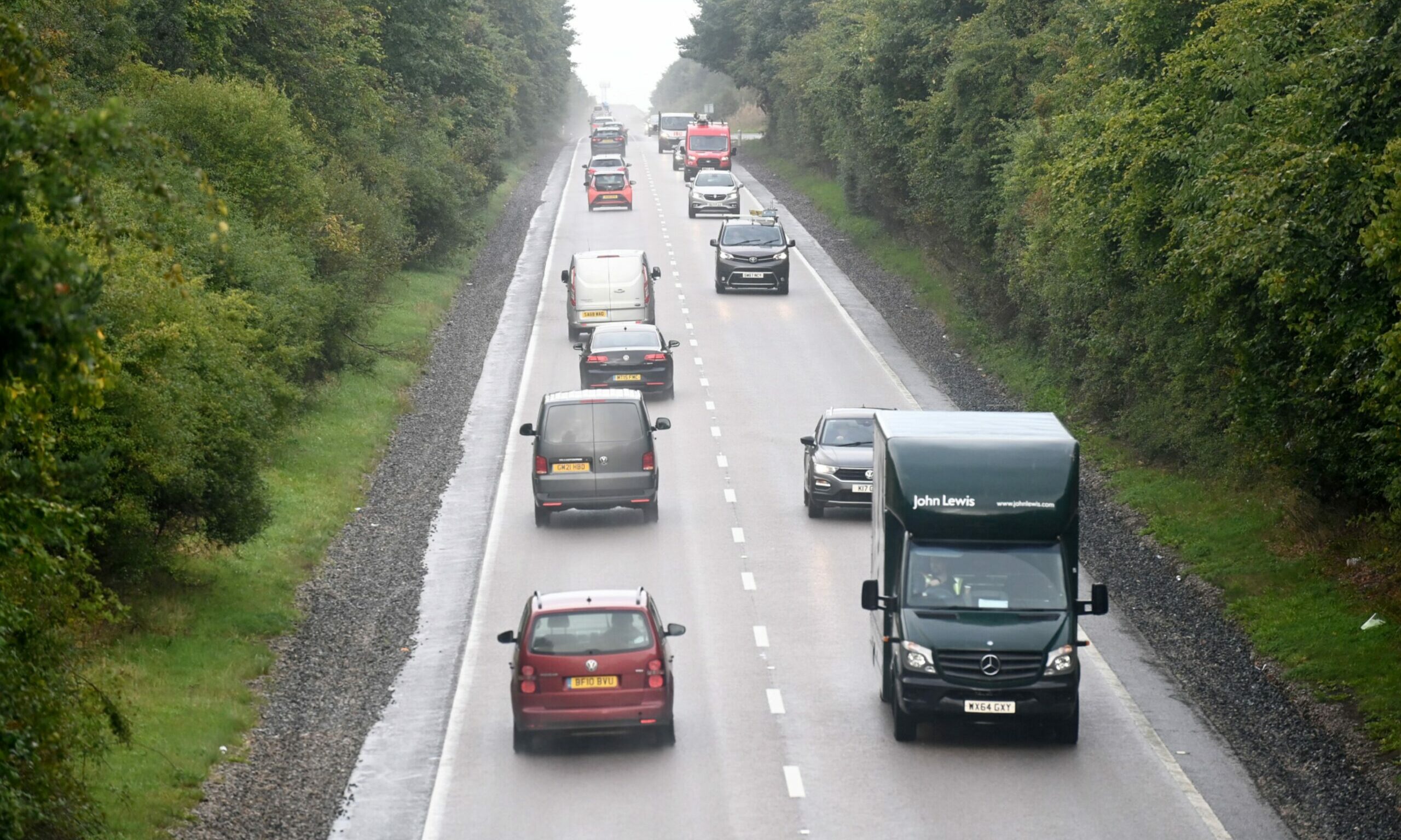 A single carriageway stretch - no A96 dualling - with cars and lorries on it