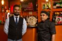 Spice Tandoori restaurant with staff standing by the bar