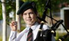 Seonaidh Forrest of Sleat, Skye with his Gold Medal as winner of the under 15 Pibroch competition piping competition. Image: Sandy McCook/ DC Thomson.