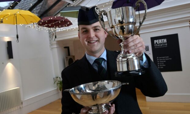Pictured at Perth Theatre is Craig Sutherland of Crieff, winner of the Premier Grade Pibroch, the James R Johnston Memorial Trophy and the John T Macrae Cup for Premier Grade March Strathspey and Reel piping competitions. Image: Sandy McCook/ DC Thomson.