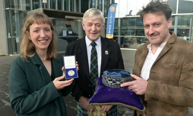 Gaelic Learner of the Year, Sheena Amos of Skye with newly crowned Gaelic Bard, Peter Mackay (right) originally from Lewis and president of An Comunn Gaidhealach, Allan Campbell. Image: Sandy McCook / DC Thomson.