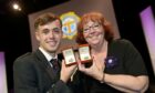 Silver Pendant winners, Jonathan Fairgrieve of Lewis who won the mens event with Rena Gertz of Prestonpans who won the ladies event in the Perth Concert Hall. Image: Sandy McCook/ DC Thomson.