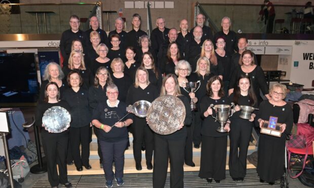 The Oban Gaelic Choir with their conductor Sileas Sinclair with the Lovat and Tullibardine Shield, the premier choral event of the week. Image: Sandy McCook/ DC Thomson.