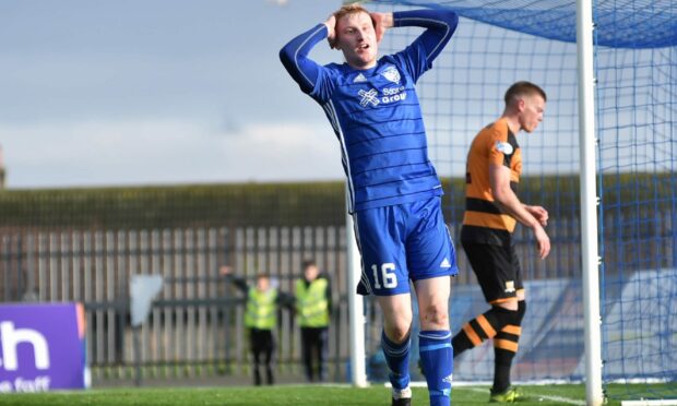 Peterhead's David Wilson has a goal chalked off for offside. Image: Duncan Brown