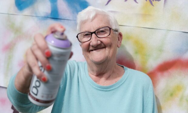 Angusfield House resident Margaret Gimson tried out graffiti art during the year of learning. Image: Four Seasons Health Care Group.