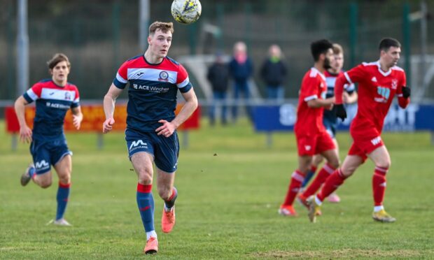 New Aberdeen signing Aaron Reid, left, in action for Turriff United. Picture by Scott Baxter