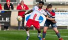 Botti Biabi, left, in action for new club Brechin City against Turriff United in the Highland League.
