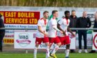 Botti Biabi, right celebrates scoring Brechin's first goal against Turriff