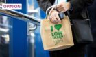 An attendee carries a bag from the Taxpayers' Alliance think tank at the 2022 Conservative Party Conference (Photo: Tolga Akmen/EPA-EFE/Shutterstock)