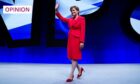 First Minister Nicola Sturgeon waves on stage after making her key note speech on the final day of the 2022 SNP Conference (Photo: Stuart Wallace/Shutterstock)