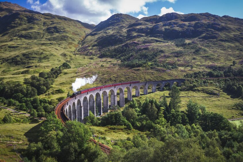 The "Hogwarts Express" in Scotland, also known as the Jacobite steam train, is here pictured on the Glenfinnan Railway Viaduct.