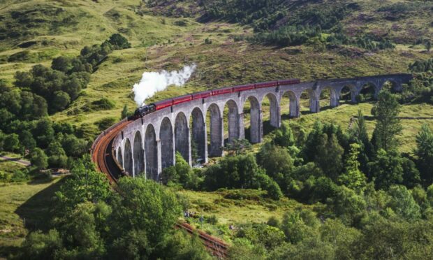 Jacobite steam train crossing the Glenfinnan Viaduct.