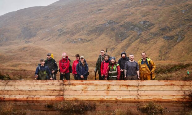 Volunteers and conservation teams helped to build dams to help restore the peatland at Glen Nevis. Supplied by John Muir Trust.