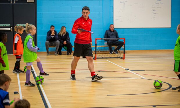 Grant Campbell, centre, has started running futsal sessions for children. Images: Wullie Marr