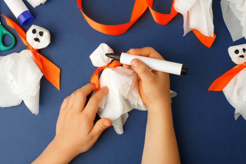 Set of materials for Halloween toys ghost from white paper napkin. 