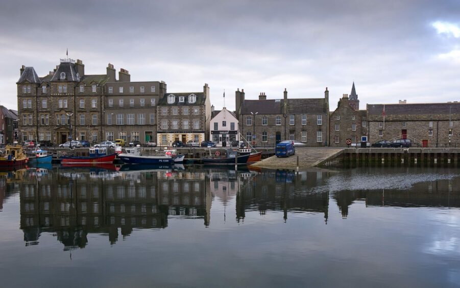 Kirkwall Harbour in Orkney from the water. 