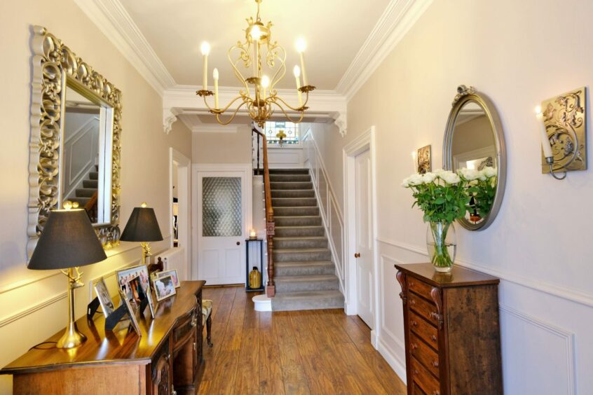 The reception hallway offers a fine welcome with a range of traditional features.