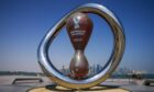 The official Fifa World Cup Countdown Clock on Doha's corniche, overlooking the skyline of Doha, Qatar.