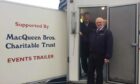 Graham MacQueen and one of the charity's volunteers with the trailer prior to the damage. Image: MacQueen Bros.