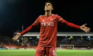 Aberdeen's Bojan Miovski celebrates after making it 1-0 against Hibs.