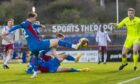Nathan Shaw tucks away his goal for Caley Thistle against Arbroath. Image: SNS
