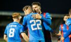 Caley Thistle's two-goal star Nathan Shaw celebrates with team-mates after scoring his late equaliser against Ayr United. Images: Craig Brown/SNS Group