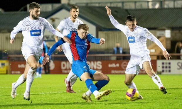 Nathan Shaw steers home Caley Thistle's equaliser against Ayr United. Images: Craig Brown/SNS Group