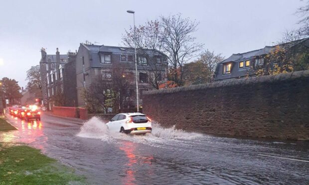 Flooding in Aberdeen's Berryden Road this morning. Image: Shona Gossip / DC Thomson.