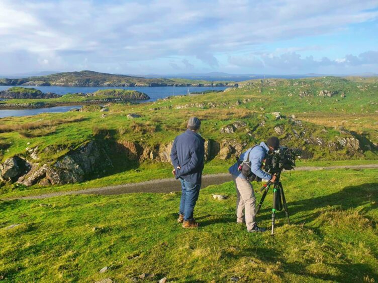 A film crew in the landscape of the Outer Hebrides.
