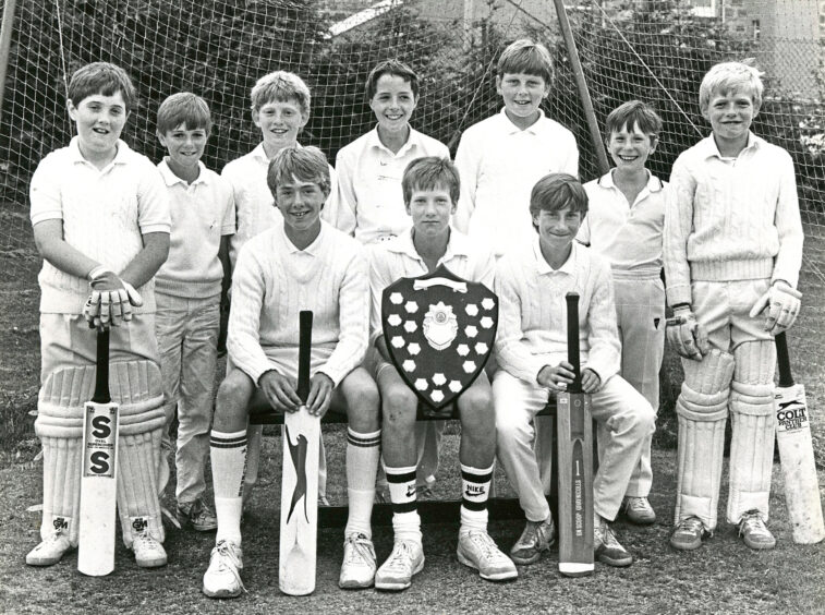 1986 - The Aberdeenshire Cricket Club under-13s celebrate another eight-a-side championship.